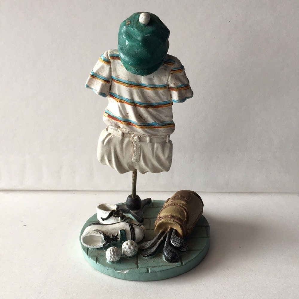 Golfer outfit figurine